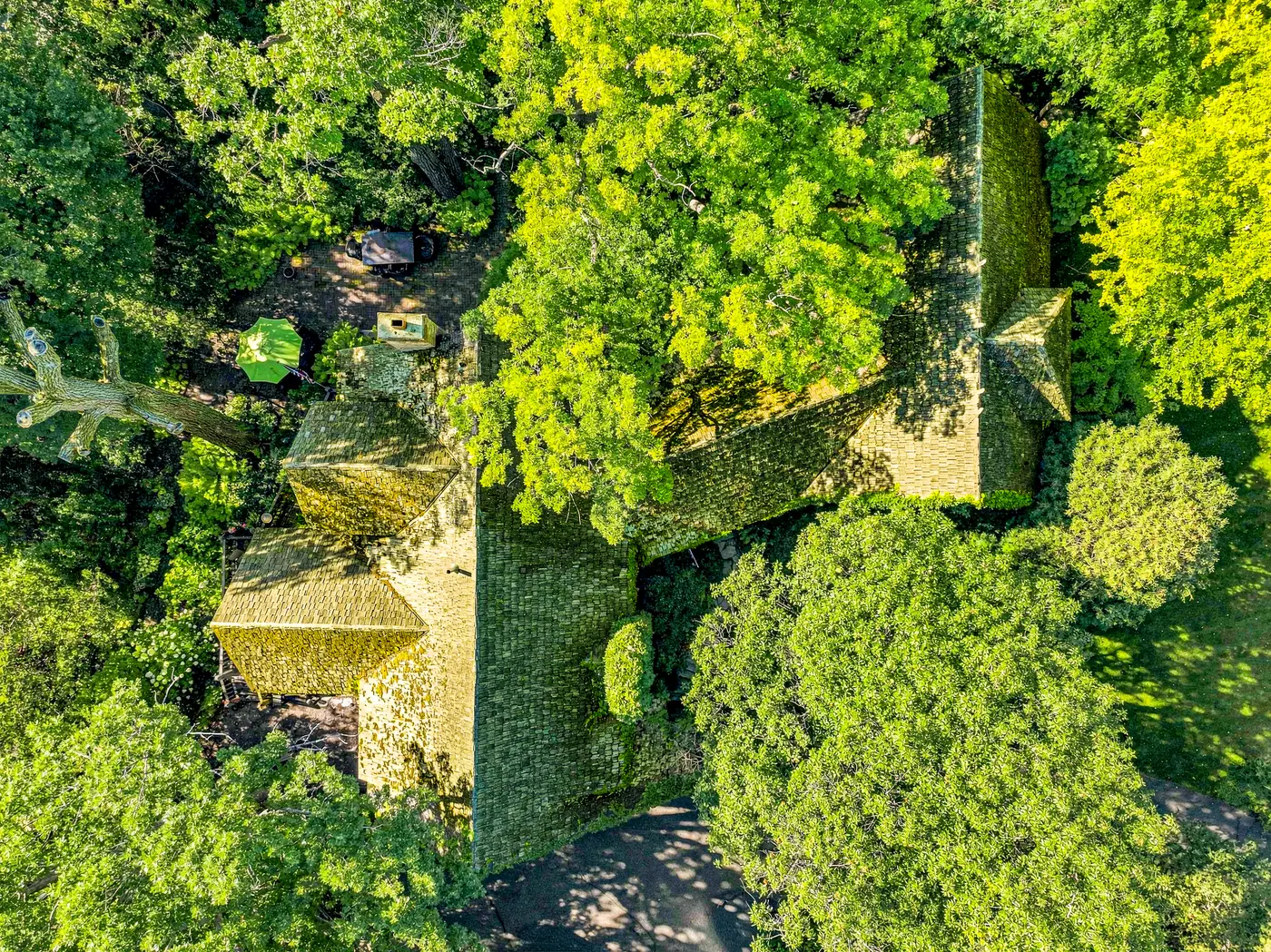 Before — Aerial view — the full roof, before and after