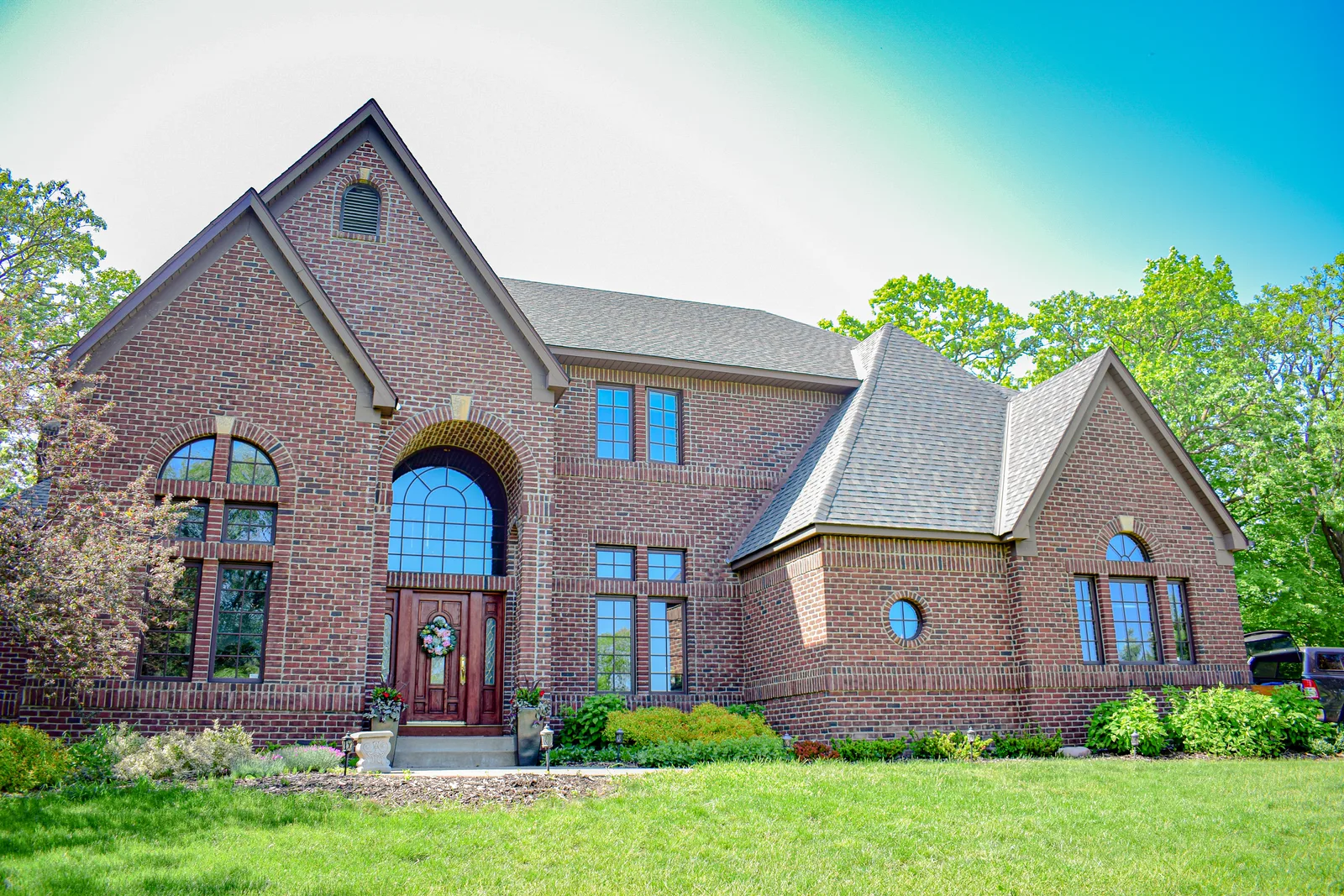 Rooflines alongside the brick gables and windows.