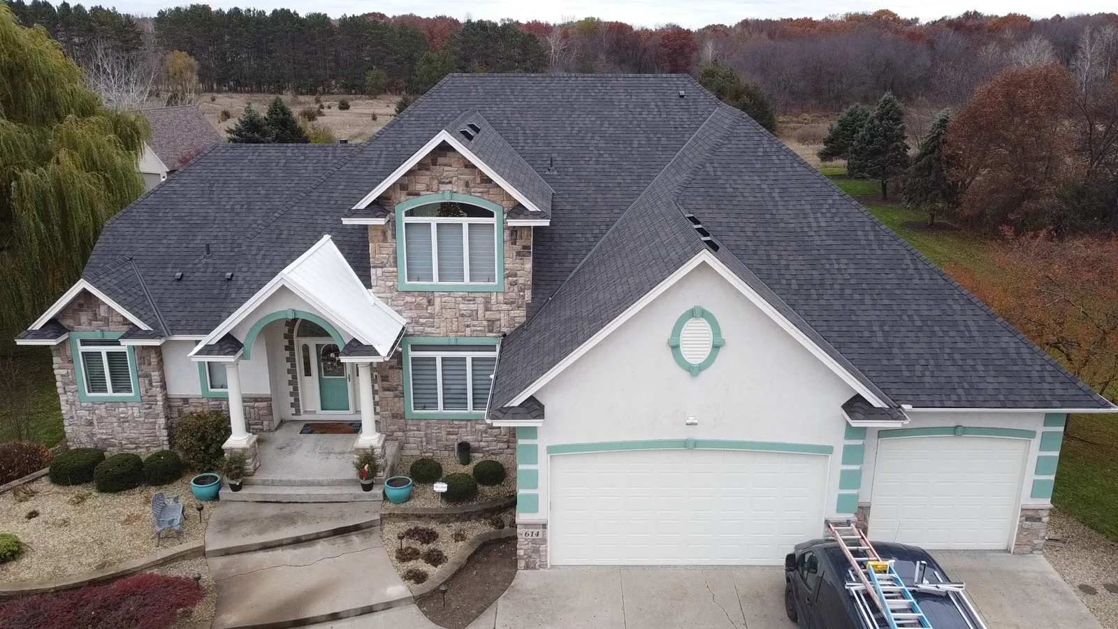 After — the front roof and garage.