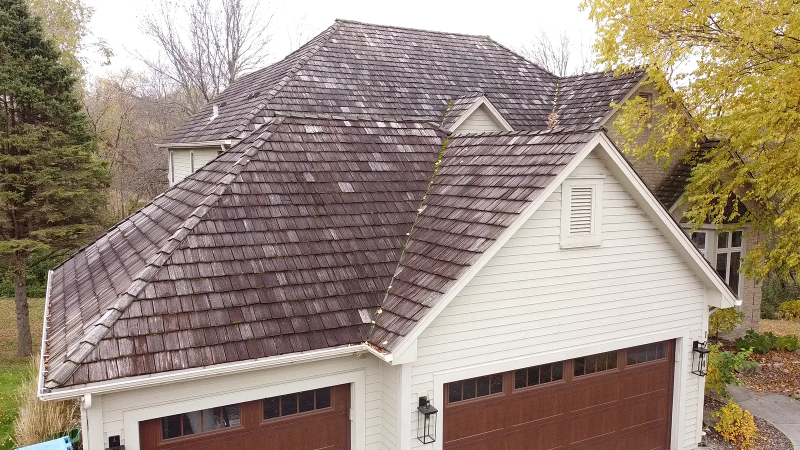 Before — weathering visible across the roof.